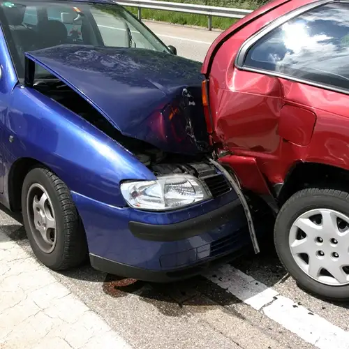 Blue And Red Car In An Accident